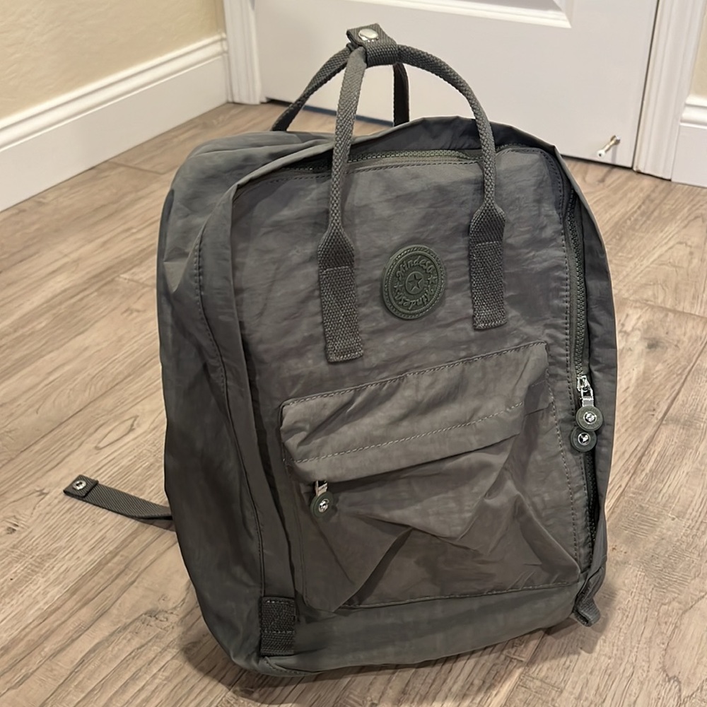 Green handle backpack